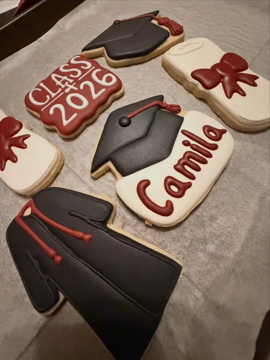 Graduation cookies for Camila in maroon and black