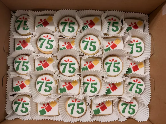 A full box of 75th birthday cookies