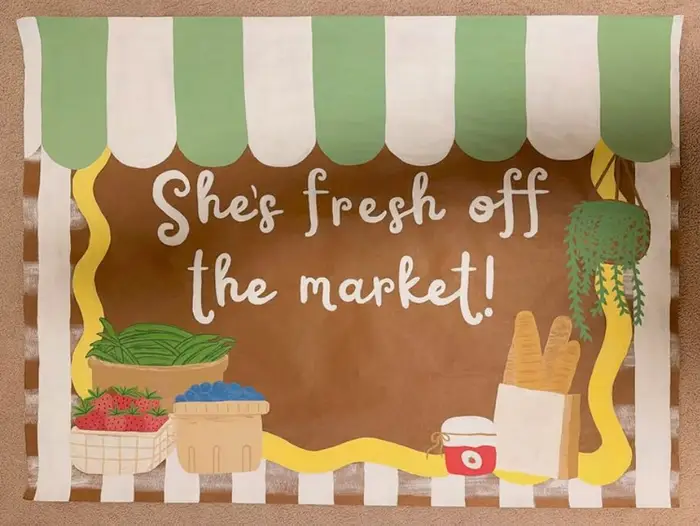 Hand-painted bridal shower poster reading "She's fresh off the market!"